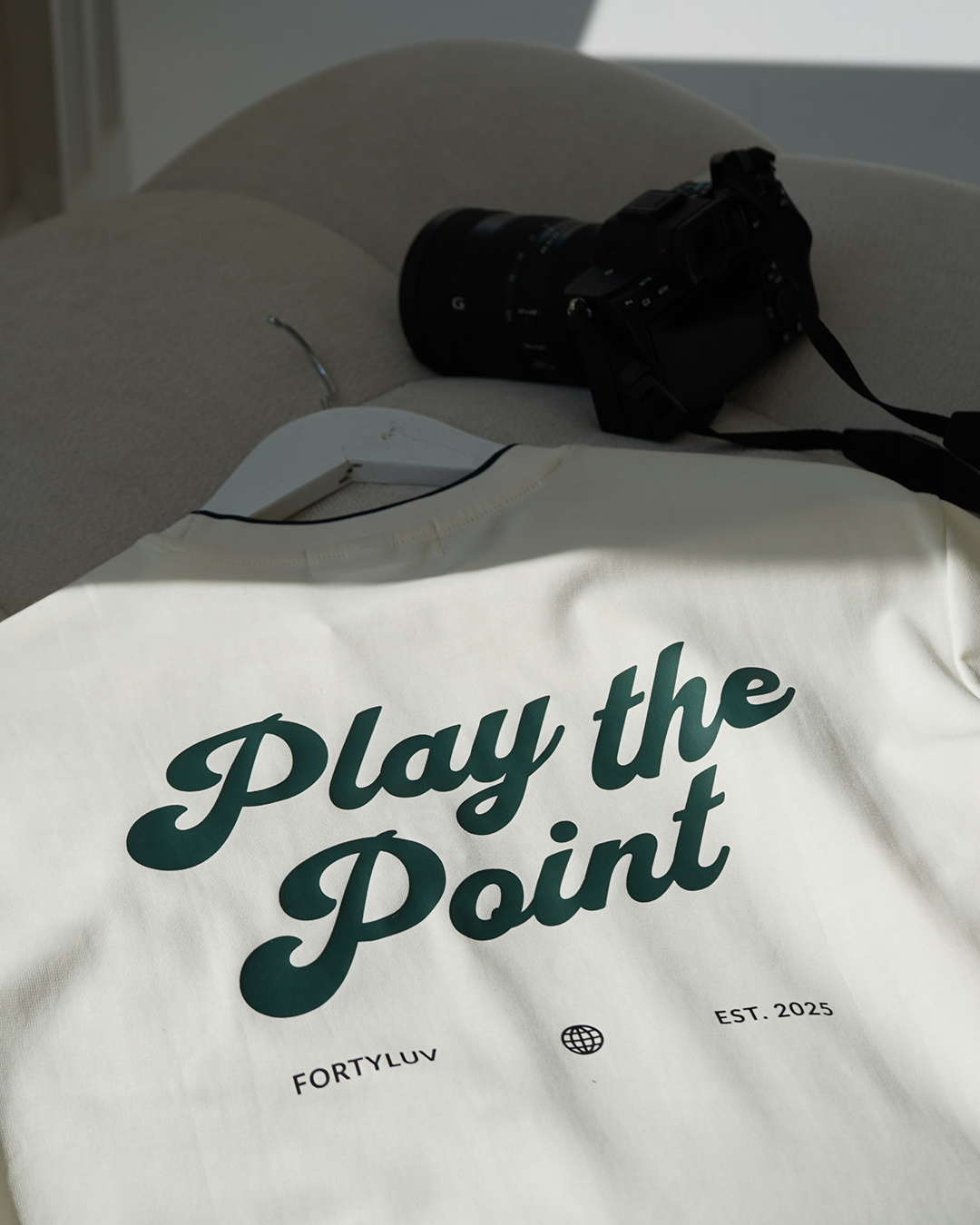 Padel Off-white t-shirt with 'Play the Point' text on the back